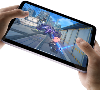 iPad mini held by a user's hands in landscape view playing a graphically intense game